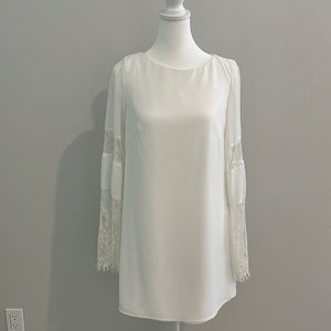 Bebe white lace bell sleeve dress